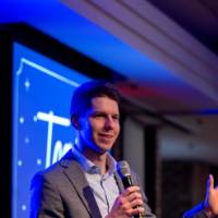 Alumni speaker shares remarks during Toast